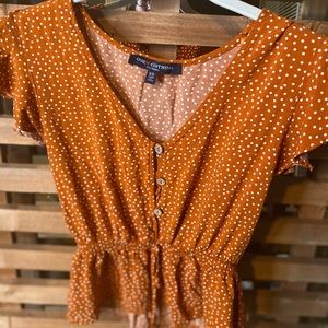 Orange polka-dot blouse